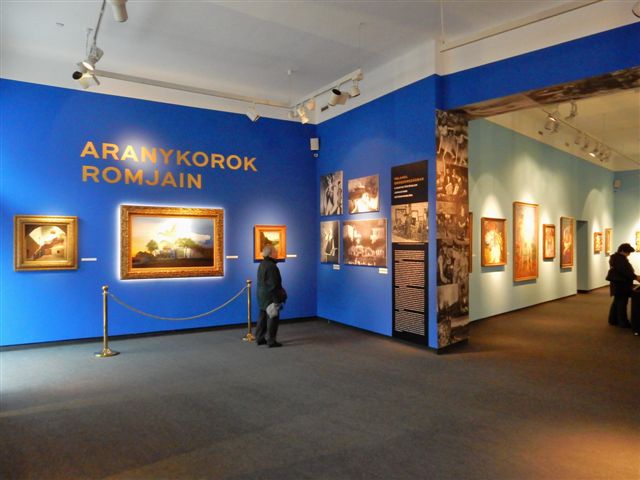 Illustration for article titled ARANYKOROK ROMJAIN-kiállítás a Kieselbach Galériában