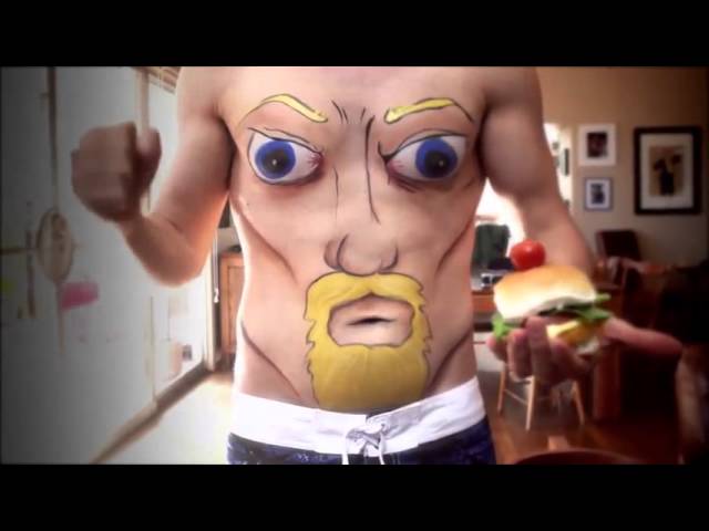 A beszélő köldök szétcsap egy hamburgert baseballütővel